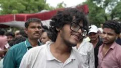 Watch: Protesters celebrate resignation of India's education minister