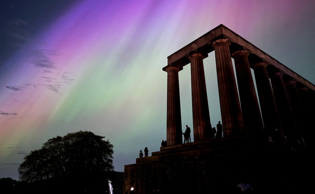 Northern lights during a solar storm over the National Monument of Scotland in Edinburgh Northern lights during a solar storm over the National Monument of Scotland in Edinburgh