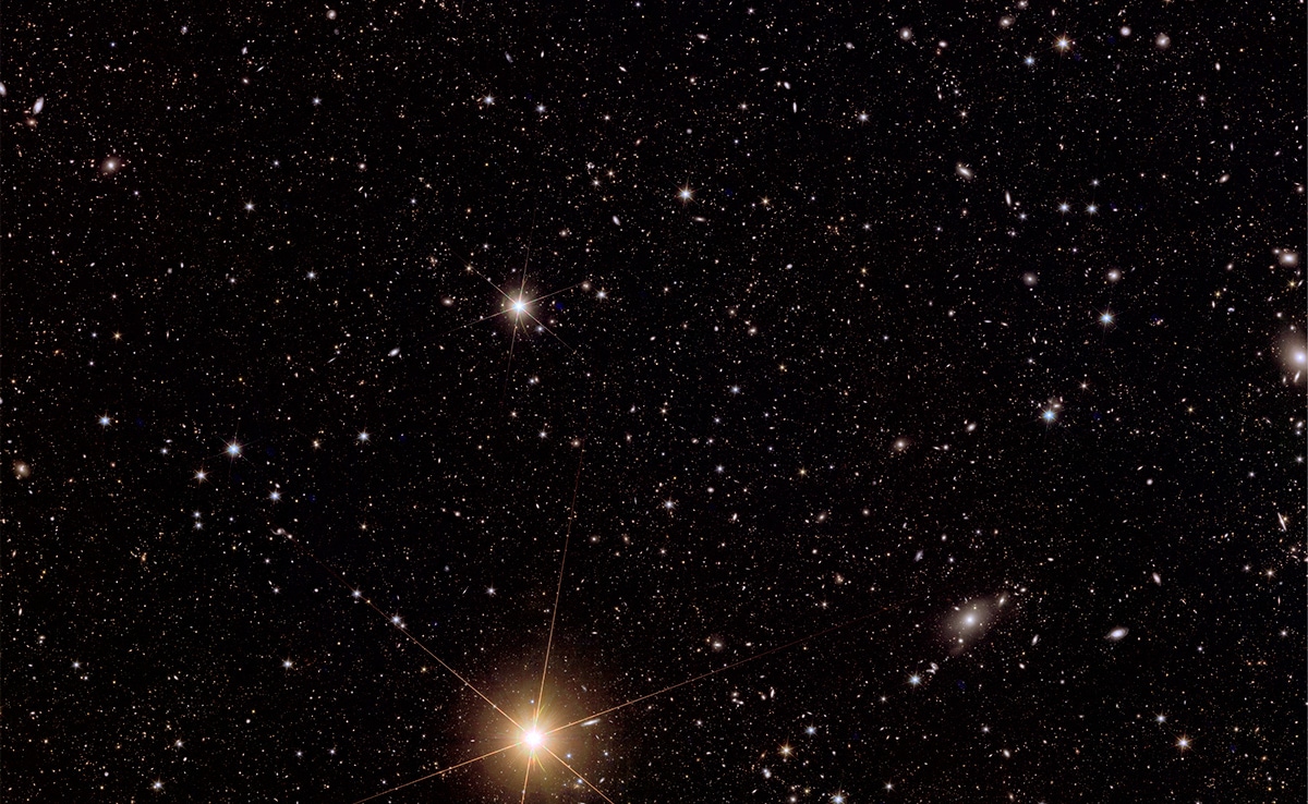 New view of galaxy cluster Abell 2764 (top right), a very dense region of space containing hundreds of galaxies orbiting within a halo of dark matter. New view of galaxy cluster Abell 2764 (top right), a very dense region of space containing hundreds of galaxies orbiting within a halo of dark matter.