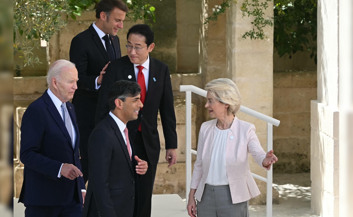 US President Joe Biden, UK PM Rishi Sunak, French President Emmanuel Macron, Japanese PM Fumio Kishida and President of the European Commission Ursula von der Leyen leave after a group photo at the G7 Summit. US President Joe Biden, UK PM Rishi Sunak, French President Emmanuel Macron, Japanese PM Fumio Kishida and President of the European Commission Ursula von der Leyen leave after a group photo at the G7 Summit.