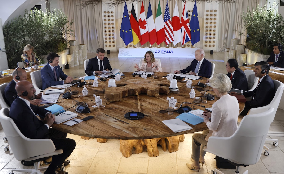 European Council PresidentCharles Michel, German Chancellor Olaf Scholz, Canadian PM Justin Trudeau, French President Emmanuel Macron, Italy PM Giorgia Meloni, US President Joe Biden, Japanese PM Fumio Kishida, UK PM Rishi Sunak and EU Chief Ursula von der Leyen attend a work session at the G7 Summit. European Council PresidentCharles Michel, German Chancellor Olaf Scholz, Canadian PM Justin Trudeau, French President Emmanuel Macron, Italy PM Giorgia Meloni, US President Joe Biden, Japanese PM Fumio Kishida, UK PM Rishi Sunak and EU Chief Ursula von der Leyen attend a work session at the G7 Summit.