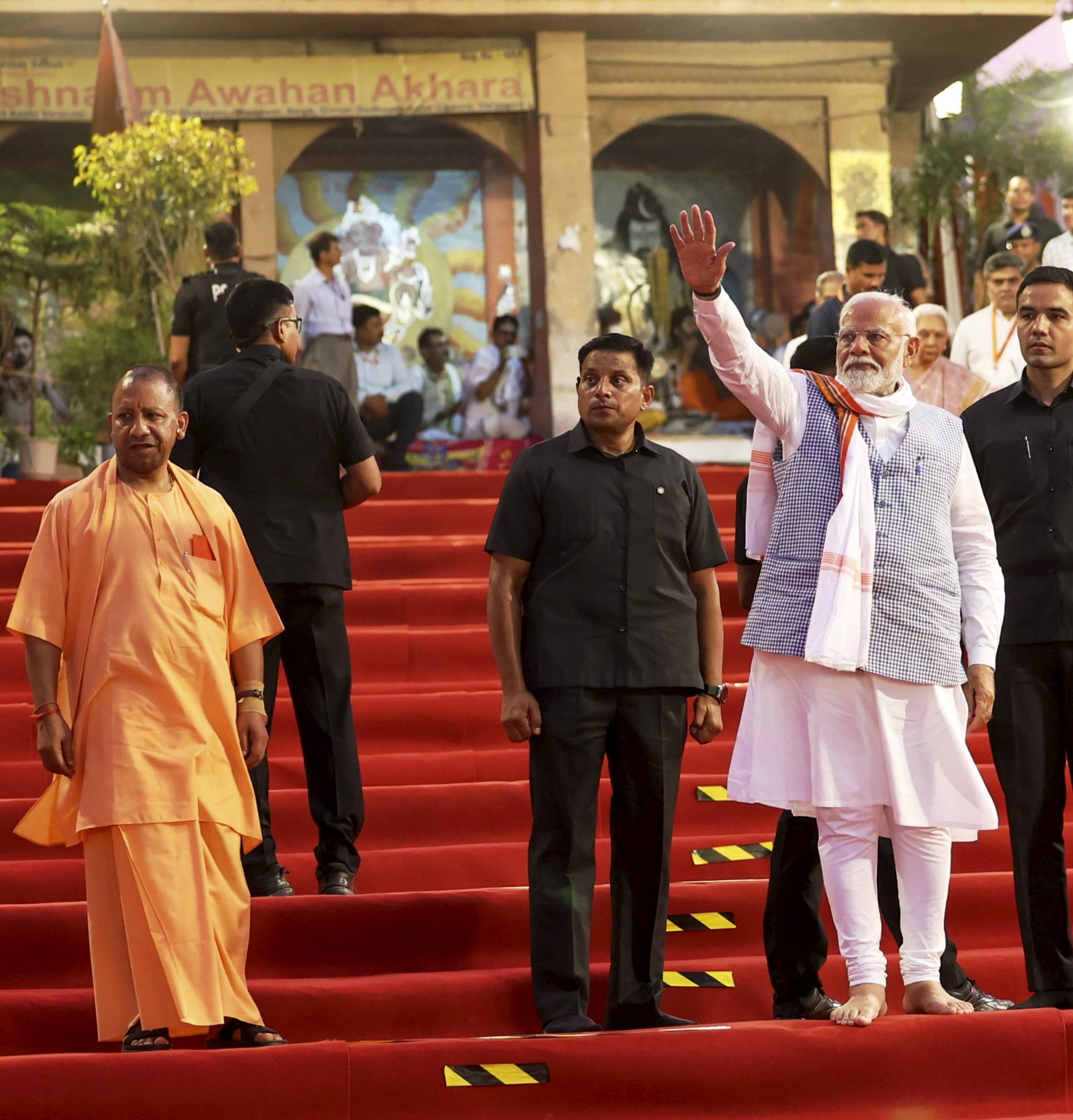 PM Modi waves as he arrives to attend Ganga Aarti (PTI) PM Modi waves as he arrives to attend Ganga Aarti (PTI)