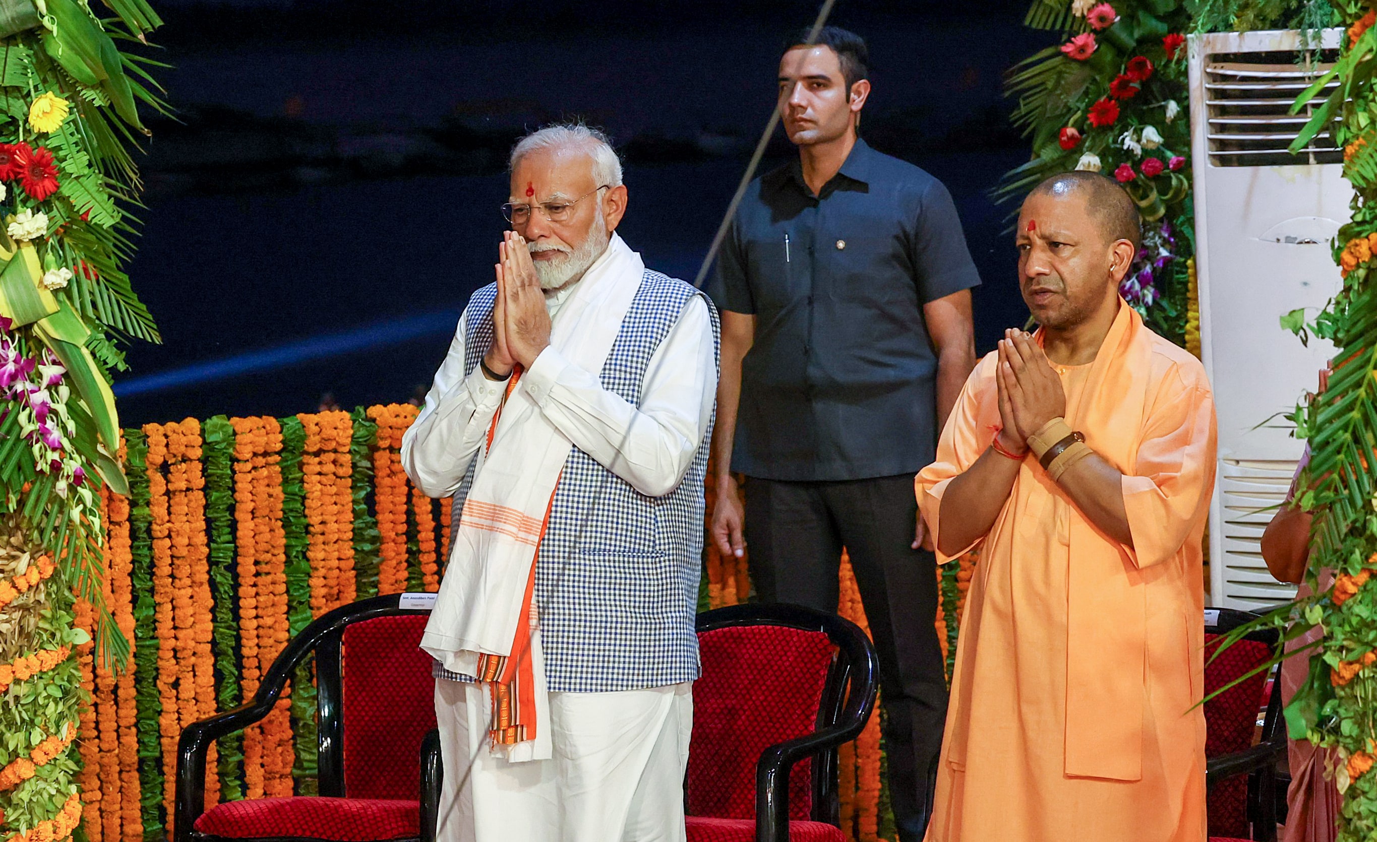 PM Modi and Yogi Adityanath offer prayers during Ganga aarti, at Dashashwamedh Ghat (ANI) PM Modi and Yogi Adityanath offer prayers during Ganga aarti, at Dashashwamedh Ghat (ANI)