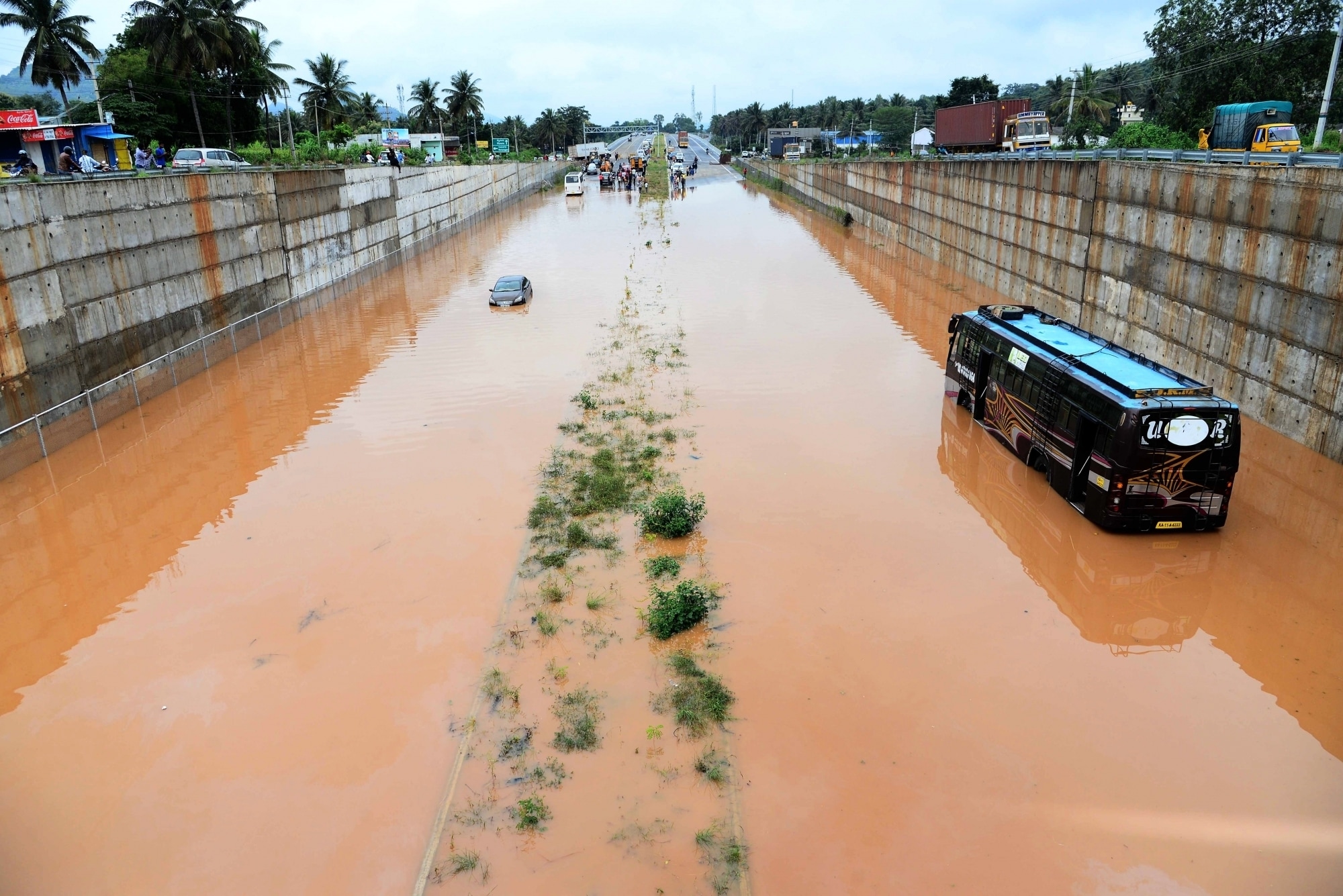Movement of traffic came to a halt on Hyderabad-Vijayawada highway as flood water submerged the highway near Suryapet in Telangana. Movement of traffic came to a halt on Hyderabad-Vijayawada highway as flood water submerged the highway near Suryapet in Telangana.