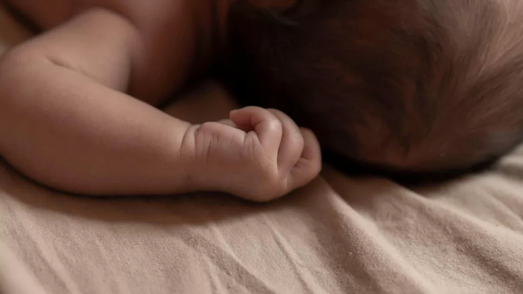 Infant loses arm due to medical negligence at govt hospital in Khammam